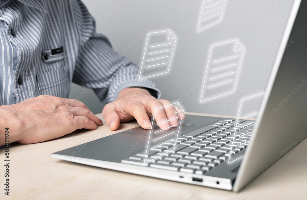 Poster businessman using laptop for electronic documents, letters sending and receiving. man sitting at des