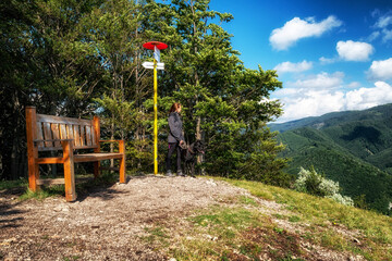 Fototapeta na wymiar Tourist attraction empty bench on top of the hill Cipcie in Slovakia