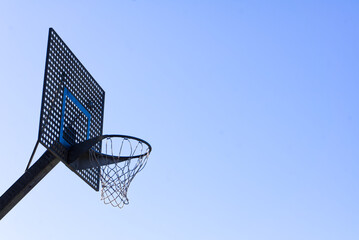 steel basket ball hoop and blue sky