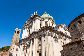 Obraz premium Brescia. Old and new Cathedral of Santa Maria Assunta in Romanesque and late Baroque style, Medieval Broletto Palace (Palazzo Broletto), XII-XXI century, Paolo VI square, Lombardy, Italy, Europe.