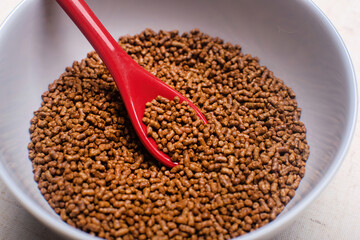 Healthy organic buckwheat tea in a gray bowl.