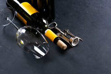Wine bottle and corkscrew. Wine bottle and glass