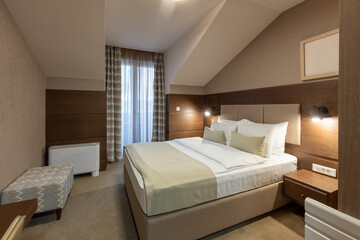 Interior of a empty hotel bedroom