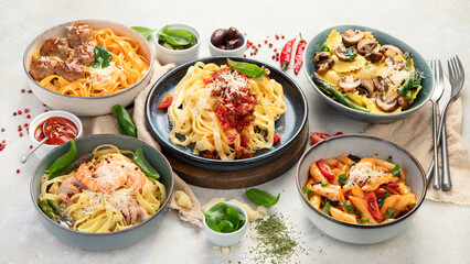 Italian pasta assortment on light background.