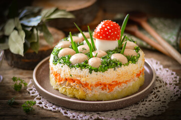 Layered salad with whole champignon mushrooms 