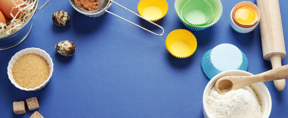 Freshly baked cake on blue background.