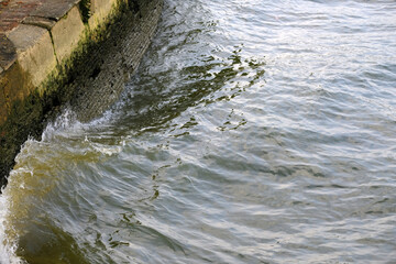 water flowing into the river