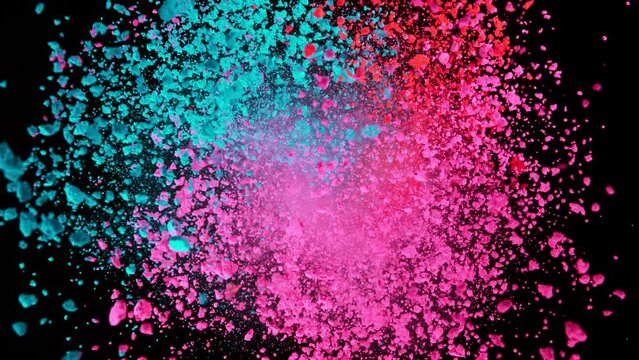 Super Slow Motion Shot of Rotating Color Powder Expolosion Isolated on Black Background at 1000fps.