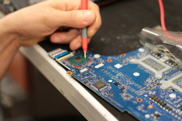 Notebook motherboard repair stage close-up