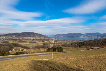 Fototapeta na wymiar Panoramic view of die small village Abtsdorf and Attersee in Upper Austria. Image taken from Kronberg mountain. Tourism and vacations concept. 