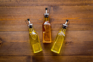 Obraz na płótnie Canvas Sunflower olive and sesame cooking oil in bottles