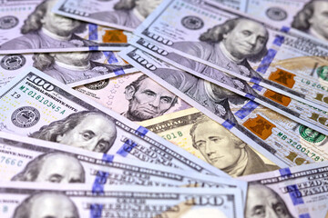 US dollars banknotes of different denominations, paper currency for background. Concept of american and global economy, exchange rate