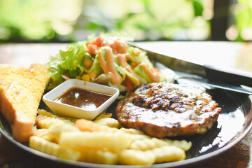 Pork neck steak on a plate ready to eat