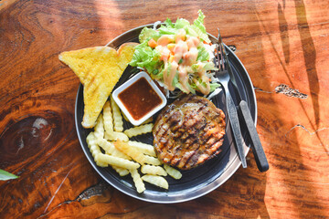 Pork neck steak on a plate ready to eat