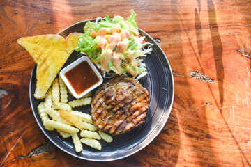 Pork neck steak on a plate ready to eat