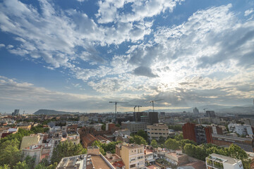 Fototapeta na wymiar Barcelona skyline with passing clouds