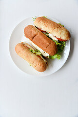 Hot dogs with sausage on a plate