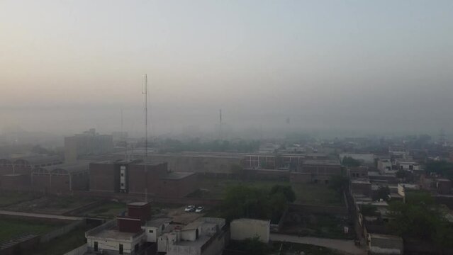 Beautiful aerial landscape at Kala Shah Kako Factory Industrial area of Punjab Pakistan at Sunset Time, drone's footage
