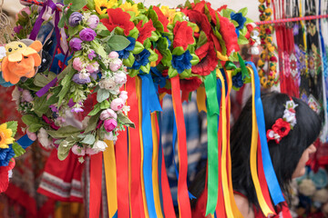 Variety of ethnic ukrainian traditional wreaths with flowers and ribbons - symbol of Ukrainian...