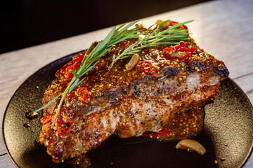 pork ribs baked in an oven with spices