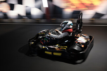Electric Go kart driver speed rive indoor circuit race - obrazy, fototapety, plakaty