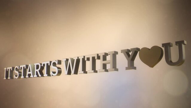Animazione 3D testo IT STARTS WITH YOU con simbolo cuore