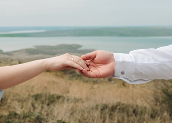 couple holding hands