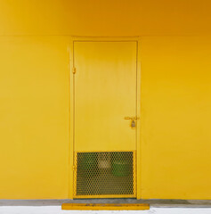 yellow door in the wall