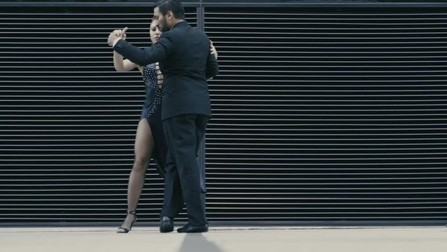 Argentine couple dancing Tango in the streets of Buenos Aires Argentina