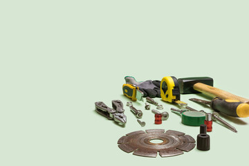 Arrangement of disc from circular saw, hammer, meter, pliers, scalpel and other tools with creative...
