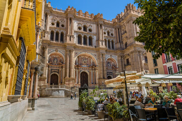 Fototapeta na wymiar View of the Cathedral of Málaga Roman Catholic church in the city of Málaga. View from the Obispo Square. Constructed between 1528 and 1782 is one of the main attraction