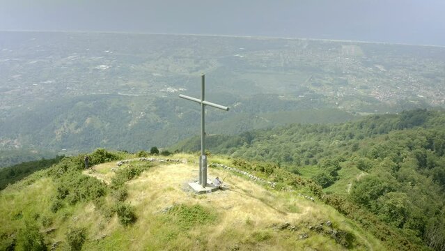 Foxhole and memorial cross on Apuane mountains second world war defence line