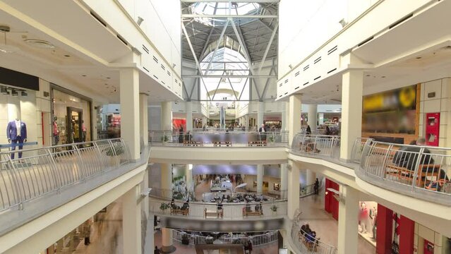Many shops in multi-level department store or shoping mall timelapse hyperlapse. Aerial view from above