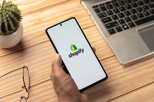 West Bangal, India - April 20, 2022 : Shopify on phone screen stock image.
