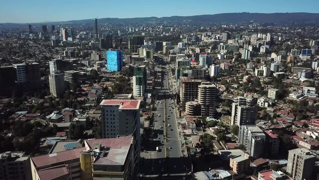 Addis Ababa, Ethiopia. Stunning aerial of dense populated area, highway traffic and high city buildings. African cityscape.