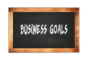 BUSINESS  GOALS text written on wooden frame school blackboard.