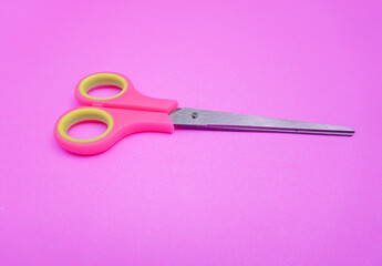colorful scissors isolated on blue