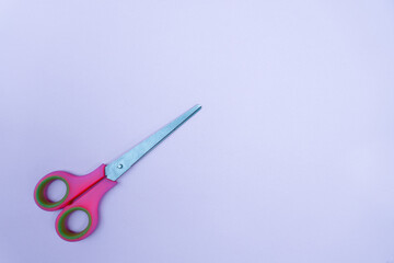 colorful scissors isolated on blue