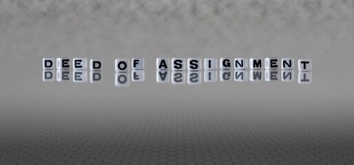 deed of assignment word or concept represented by black and white letter cubes on a grey horizon background stretching to infinity