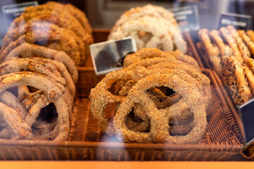Bakery, pretzel on the display counter for sale. Famous german bread in bakery store.