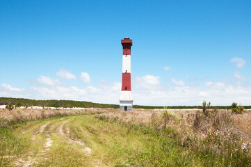 Fototapeta na wymiar View of sarita lighthouse with blue sky and clouds in the 