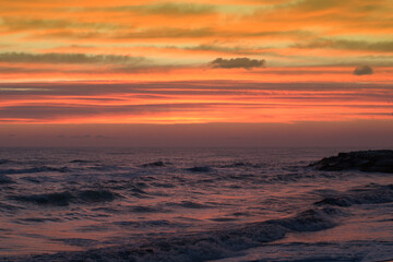 Fototapeta na wymiar sunset in the sea,ocean, sunrise, water,sunset, sea, sky,waves, horizon, beautiful, evening,nature, orange,