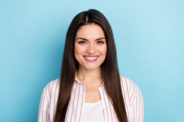 Fototapeta premium Portrait of attractive cheerful long-haired girl employee good mood isolated over blue pastel color background