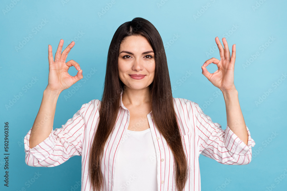 Canvas Prints Portrait of attractive cheerful long-haired girl showing double ok-sign ad reate isolated over blue pastel color background