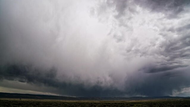 Dark rainstorm rolling through the landscape in Wyoming during the Spring near Cokeville.