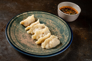 Fried dumplings with soy sauce