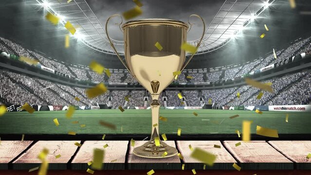 Animation of confetti falling over gold cup in sports stadium