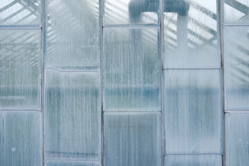 Conservatory windows streaked with condensation