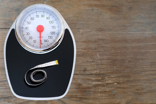 Floor Mechanical Scales In Vintage Style, Scale With Red Arrow In Circle, Centimeter Measuring Tape, Top View, The Concept Of Weight Control, Human Physical Health, Diet And Nutrition, Lose Weight