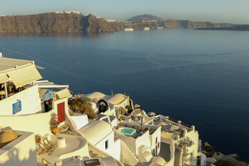 The whitewashed hillside buildings of the village Oia, Santorini, Greece